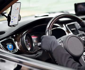 Driver using GPS navigation in a car